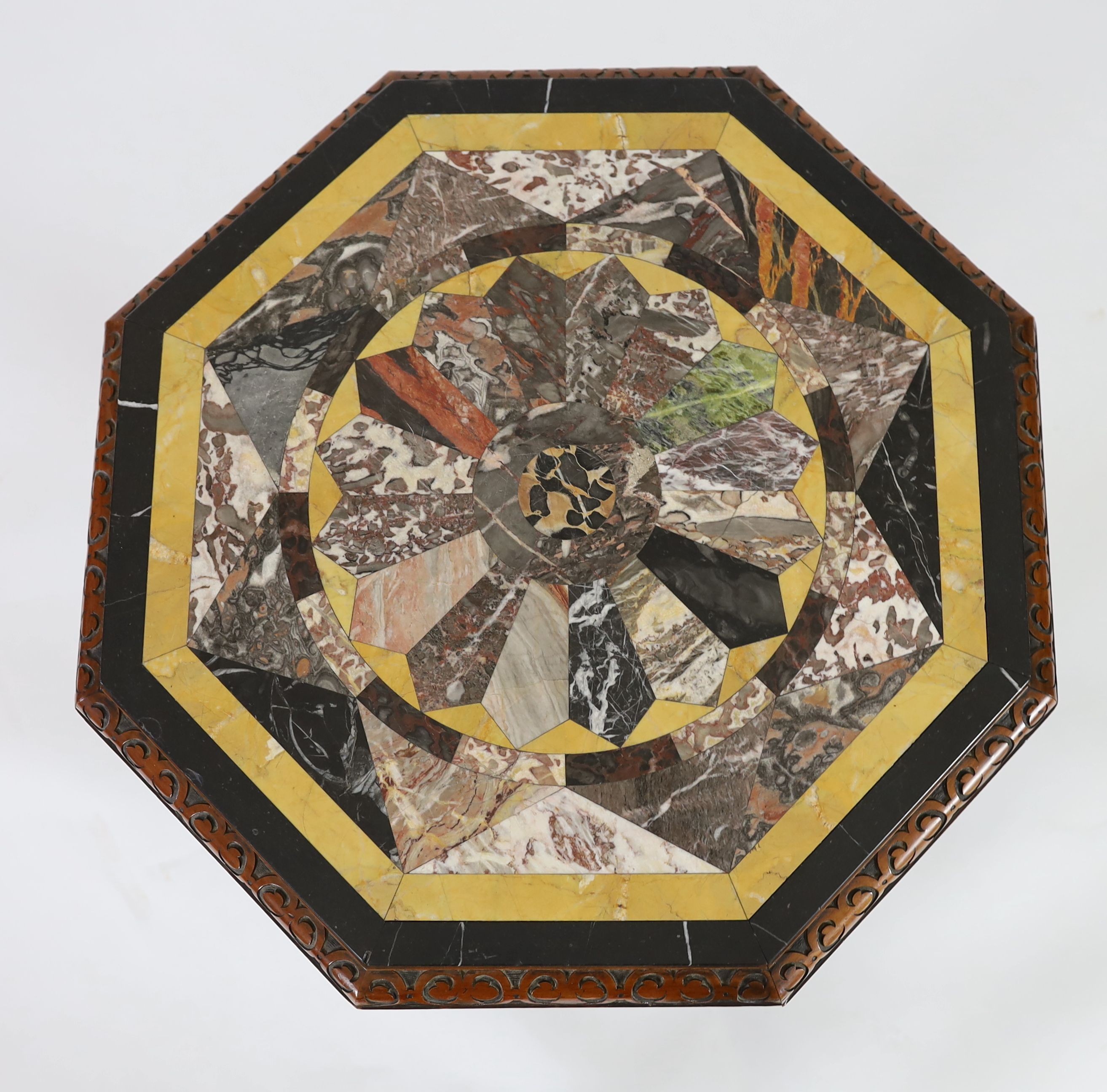 A Victorian parcel gilt carved mahogany and pietra dura centre table, W.69cm H.72cm